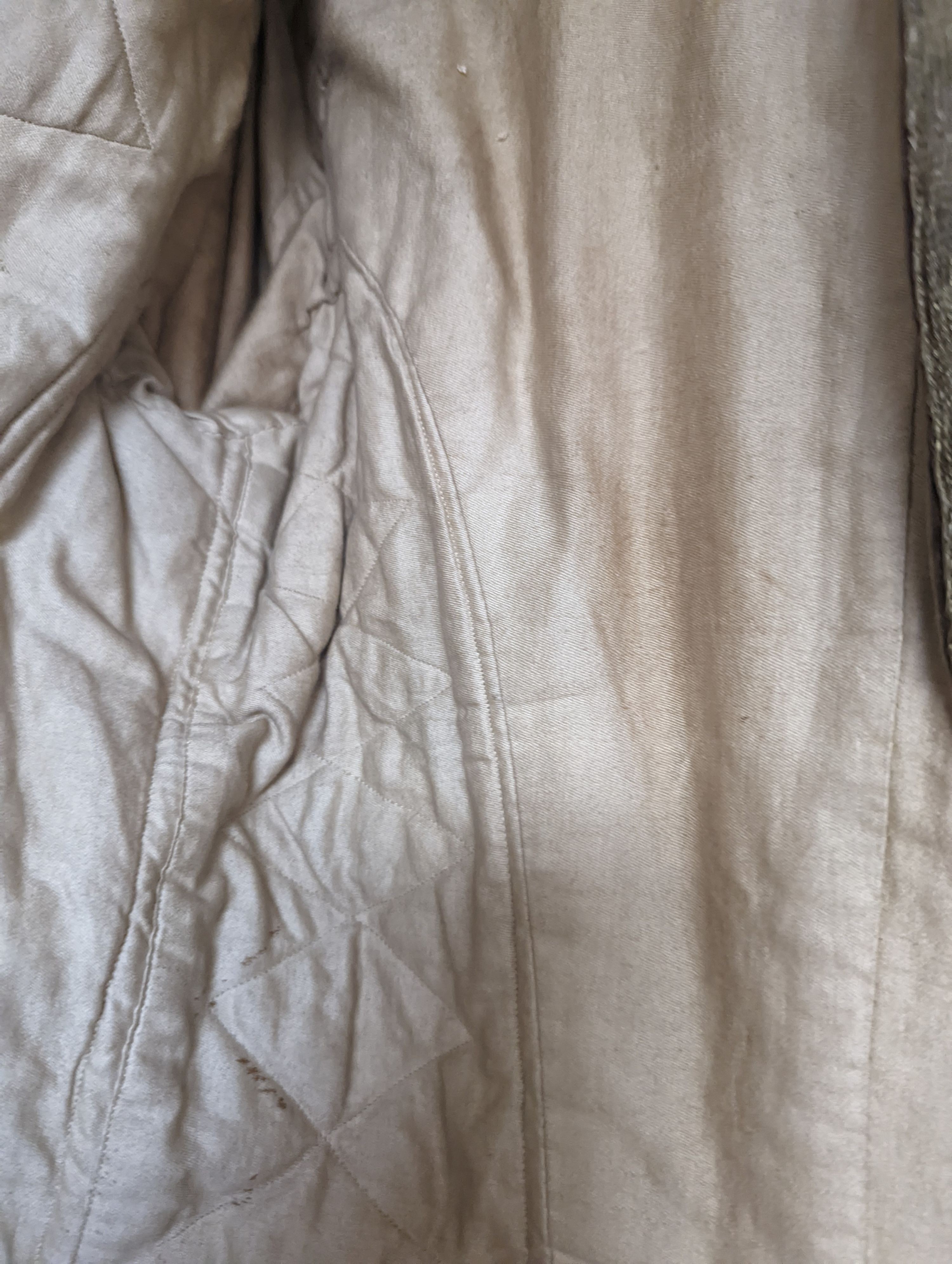 A Georgian gents cream damask waistcoat, a similar waistcoat with beading applied later and a velvet and gold braided tailcoat